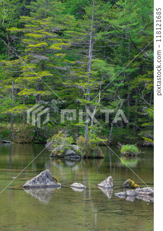 Kamikochi, a scenic mountain spot in Azumi, Matsumoto City, Nagano Prefecture, Japan. Ninoike Pond, one of the Myojin Ponds in the Okumiya area of Hotaka Shrine Kamikochi, a scenic mountain spot in Azumi, Matsumoto City, Nagano Prefecture, Japan. Ninoike Pond, one of the Myojin Ponds in the Okumiya area of Hotaka Shrine 118121685