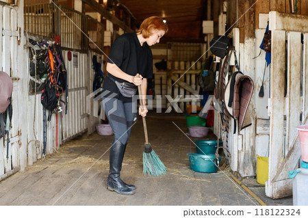 Sweeping Stable Corridor with a Broom in Hand Sweeping Stable Corridor with a Broom in Hand 118122324