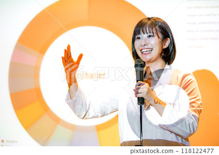 A female doctor giving a seminar. Photo courtesy of Denpa Gakuen, Tokyo Electronics College. 118122477