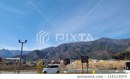 A rural town with mountains A rural town with mountains 118123074