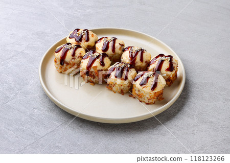 delicious fresh baked sushi roll with crab mayonnaise Philadelphia cheese. delicious fresh baked sushi roll with crab mayonnaise Philadelphia cheese. 118123266