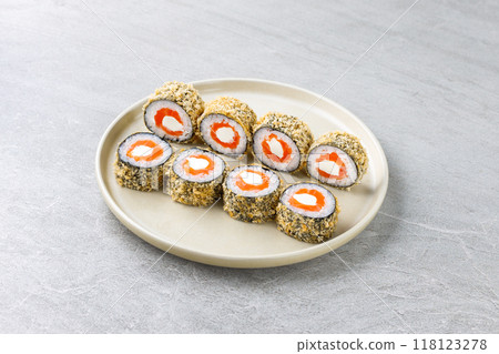 Japanese sushi tempura maki crab meat and tobiko roll on slate. Japanese traditional fusion food style, restaurant menu 118123278