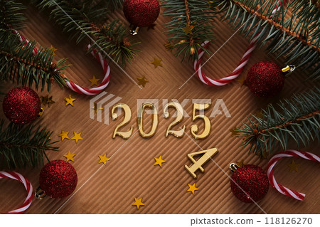 New Year 2025 beige background. Number of the coming year in Christmas decoration. 118126270