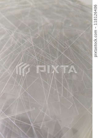 Texture of transparent plastic. Trims of acrylic transparent thin plastic. 118126486