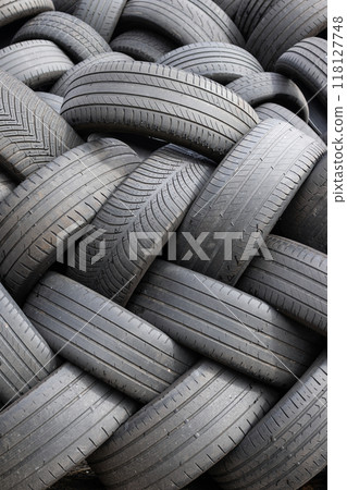 Background of Stack of used car tires waiting to be recycled 118127748
