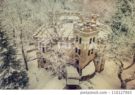 Old castle in the winter Glen park. Tallinn, Estonia. 118127983