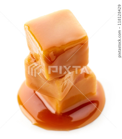 stack of caramel candies 118128429