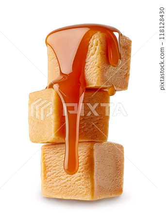 stack of sweet caramel candies 118128430