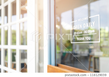Welcome open sign on shop door. Text on cafe front or restaurant hang on door at entrance. vintage tone style. banner. Welcome open sign on shop door. Text on cafe front or restaurant hang on door at entrance. vintage tone style. banner. 118129039