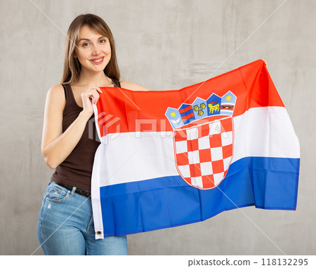 Young happy pretty woman displaying flag of croatia Young happy pretty woman displaying flag of croatia 118132295
