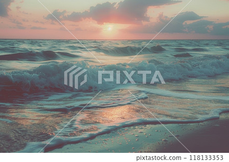 Close up of ocean wave at sunset with colorful sky Close up of ocean wave at sunset with colorful sky 118133353