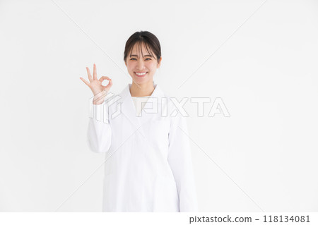 A lady in white 118134081