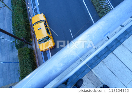 A taxi seen from the bridge A taxi seen from the bridge 118134533