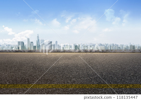 Empty asphalt road with cityscape background 118135447