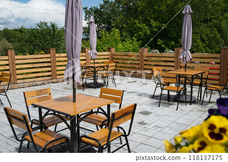 Colorful petunias in hanging pots 118137175
