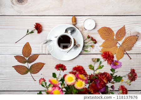 Festive autumn decor from pumpkins, berries and leaves on a white wooden background. Concept of Thanksgiving day or Halloween. Flat lay autumn composition with copy space. 118137676