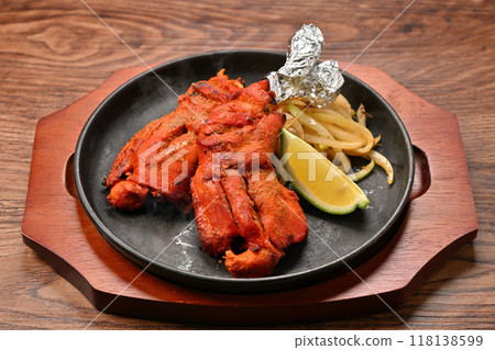 Note: Steam is synthetic. Tandoori chicken, Indian cuisine, spiced grilled chicken on the bone 118138599