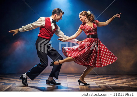 Young attractive couple dancing classic rock n roll 118139651