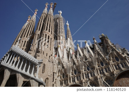 The various towers of the Sagrada Familia seen from the Passion façade The various towers of the Sagrada Familia seen from the Passion façade 118140520