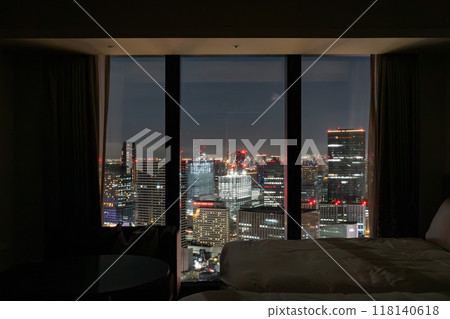 Night view from a beautiful room at Osaka Station Hotel, located in JP Tower Osaka (KITTE Osaka), directly connected to the west exit of Osaka Station. Night view from a beautiful room at Osaka Station Hotel, located in JP Tower Osaka (KITTE Osaka), directly connected to the west exit of Osaka Station. 118140618