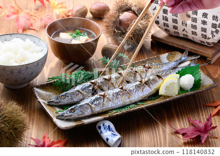 Autumn flavors: grilled salted saury, chestnuts, miso soup and rice Autumn flavors: grilled salted saury, chestnuts, miso soup and rice 118140832