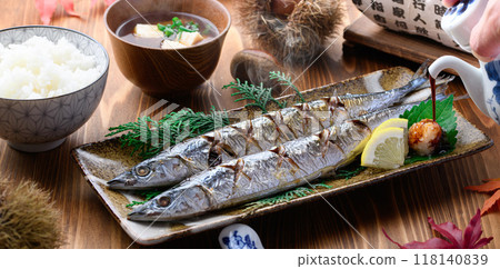 Autumn flavors: grilled salted saury, chestnuts, miso soup and rice Autumn flavors: grilled salted saury, chestnuts, miso soup and rice 118140839