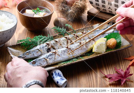 Autumn flavors: grilled salted saury, chestnuts, miso soup and rice Autumn flavors: grilled salted saury, chestnuts, miso soup and rice 118140845