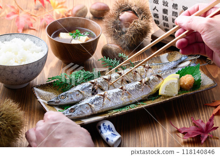 Autumn flavors: grilled salted saury, chestnuts, miso soup and rice Autumn flavors: grilled salted saury, chestnuts, miso soup and rice 118140846