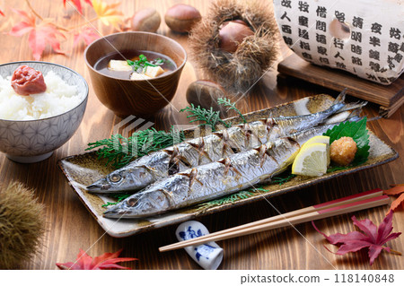 Autumn flavors: grilled salted saury, chestnuts, miso soup and rice Autumn flavors: grilled salted saury, chestnuts, miso soup and rice 118140848