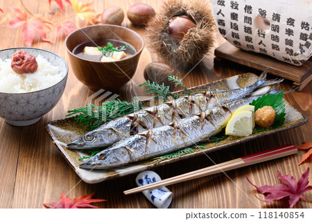 Autumn flavors: grilled salted saury, chestnuts, miso soup and rice Autumn flavors: grilled salted saury, chestnuts, miso soup and rice 118140854