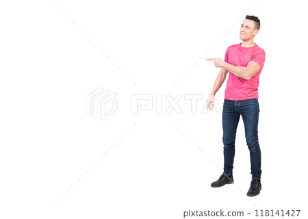Cheerful man pointing aside in studio. White background Cheerful man pointing aside in studio. White background 118141427