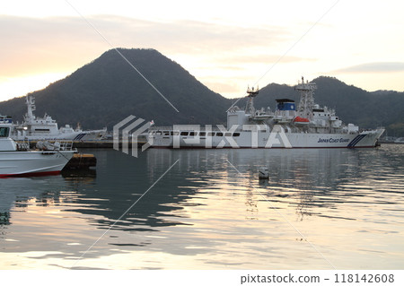 Patrol boat anchored in port 118142608