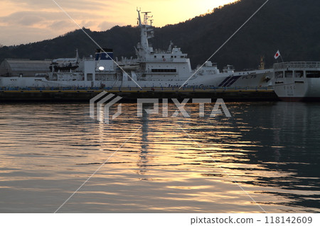 Patrol boat anchored in port 118142609