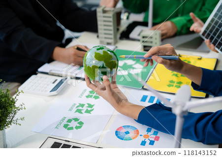 colleagues discussing data working and tablet, laptop with on Construction Site project, green energy and solar panel concept. 118143152