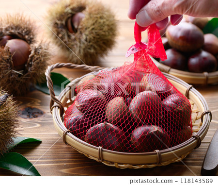 Autumn taste: Chestnuts (in a bag) Autumn taste: Chestnuts (in a bag) 118143589