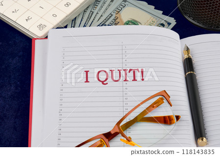 Life and business motivational inspirational concept. I QUIT writing in a notebook on a dark background 118143835