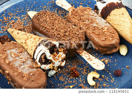 Vanilla ice cream with chocolate. Vanilla ice cream with chocolate. 118145651