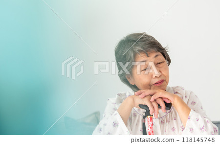 Senior woman sticking her head Senior woman sticking her head 118145748