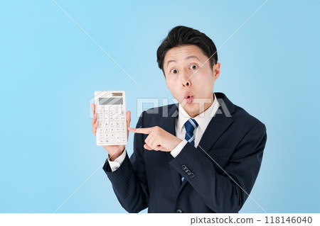 Man showing calculator, business, surprised Man showing calculator, business, surprised 118146040