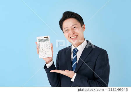 Man holding a calculator Business Recommendation 118146043