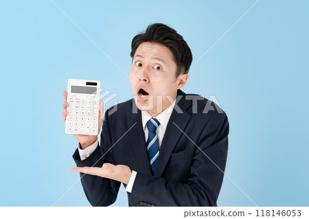 Man showing calculator, business, surprised 118146053