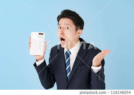 Man showing calculator, business, surprised Man showing calculator, business, surprised 118146054