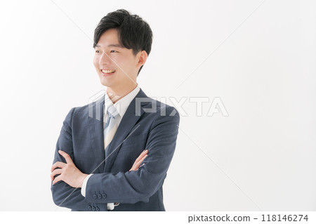 Businessman with arms folded Businessman with arms folded 118146274