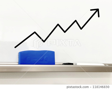 A jagged arrow pointing up on a whiteboard with a marker and eraser A jagged arrow pointing up on a whiteboard with a marker and eraser 118146830