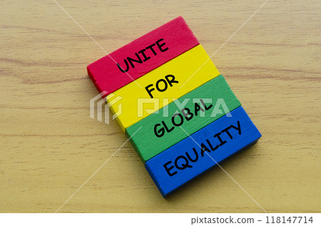 Unite For Global Equality text on multicolored wooden blocks. Against discrimination, racism and harassment concept Unite For Global Equality text on multicolored wooden blocks. Against discrimination, racism and harassment concept 118147714