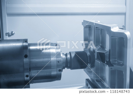 The horizontal CNC milling machine rough cutting the aluminum parts with indexable tool in the light blue scene. The horizontal CNC milling machine rough cutting the aluminum parts with indexable tool in the light blue scene. 118148743