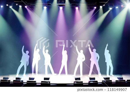 Seven male silhouettes dancing with their index fingers raised on a spotlit stage_white 118149907