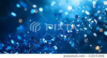 Blue confetti falling on a blue background with bokeh and copy space for design. Blue confetti falling on a blue background with bokeh and copy space for design. 118151806