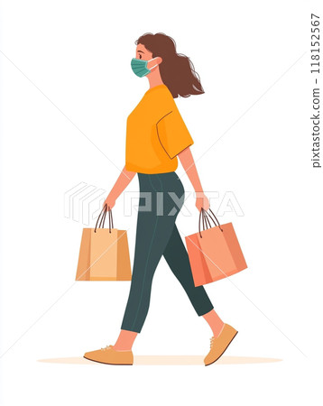A woman wearing a medical mask, walking and shopping with several bags in her hands. A woman wearing a medical mask, walking and shopping with several bags in her hands. 118152567