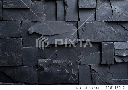 Dark gray slate wall cladding background, the texture of a natural stone panel for interior or exterior decoration. Dark gray slate wall cladding background, the texture of a natural stone panel for interior or exterior decoration. 118152642